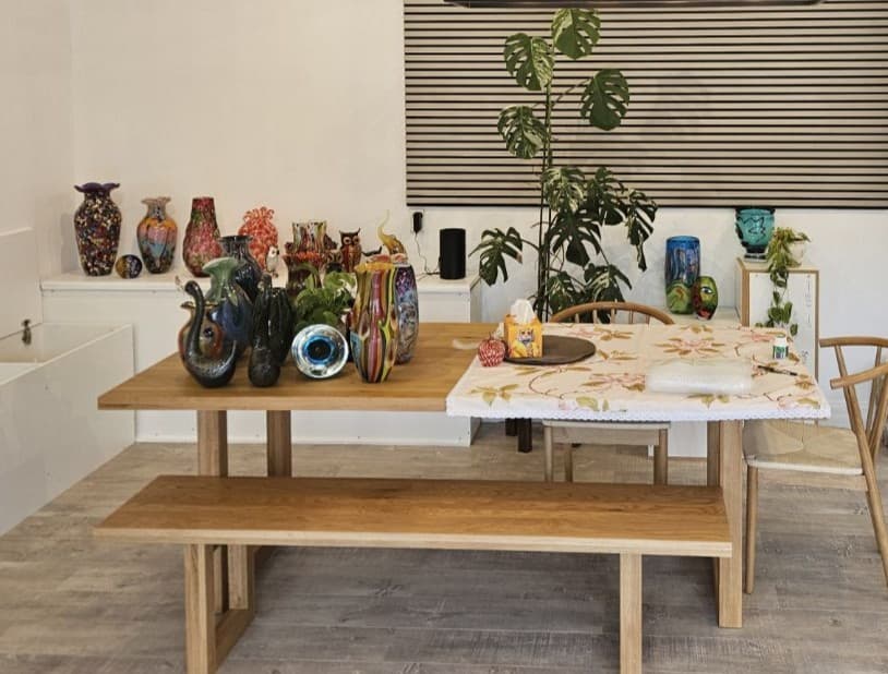 Bella Vaso handcrafted glass pieces displayed in an Auckland studio